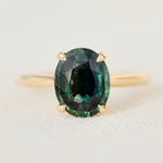 oval teal sapphire solitaire ring