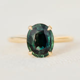 oval teal sapphire solitaire ring