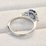 oval blue teal sapphire platinum trilogy engagement ring