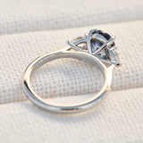 oval blue teal sapphire platinum trilogy engagement ring