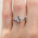pear shape salt and pepper engagement ring in platinum