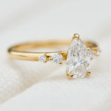 pear shape lab grown diamond engagement ring in yellow gold