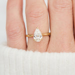 pear shape lab grown diamond yellow gold solitaire engagement ring