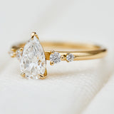 pear shape lab grown diamond engagement ring in yellow gold