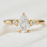 pear shape lab grown diamond engagement ring in yellow gold