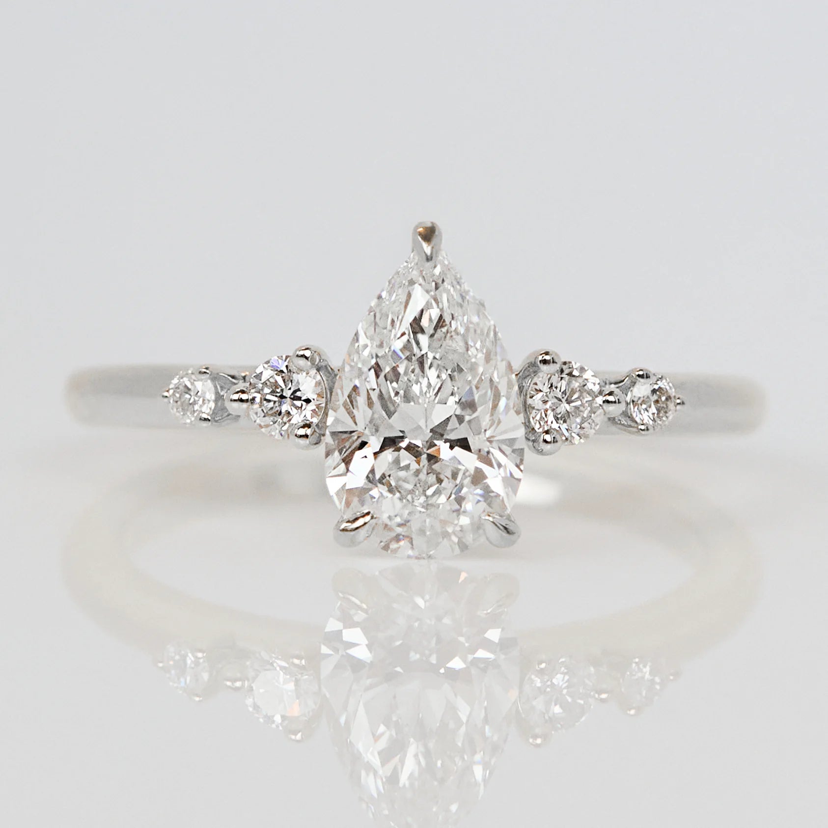 pear shape lab grown diamond platinum engagement ring