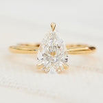 pear shape lab grown diamond yellow gold solitaire engagement ring