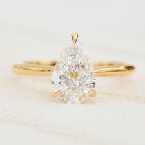 pear shape lab grown diamond yellow gold solitaire engagement ring