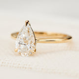 pear shape lab grown diamond yellow gold solitaire engagement ring