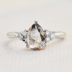 pear shape salt and pepper diamond engagement ring in platinum