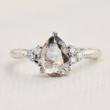 pear shape salt and pepper diamond engagement ring in platinum