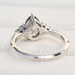 pear shape salt and pepper diamond engagement ring in platinum