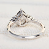 pear shape salt and pepper diamond engagement ring in platinum