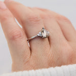 pear shape salt and pepper diamond engagement ring in platinum