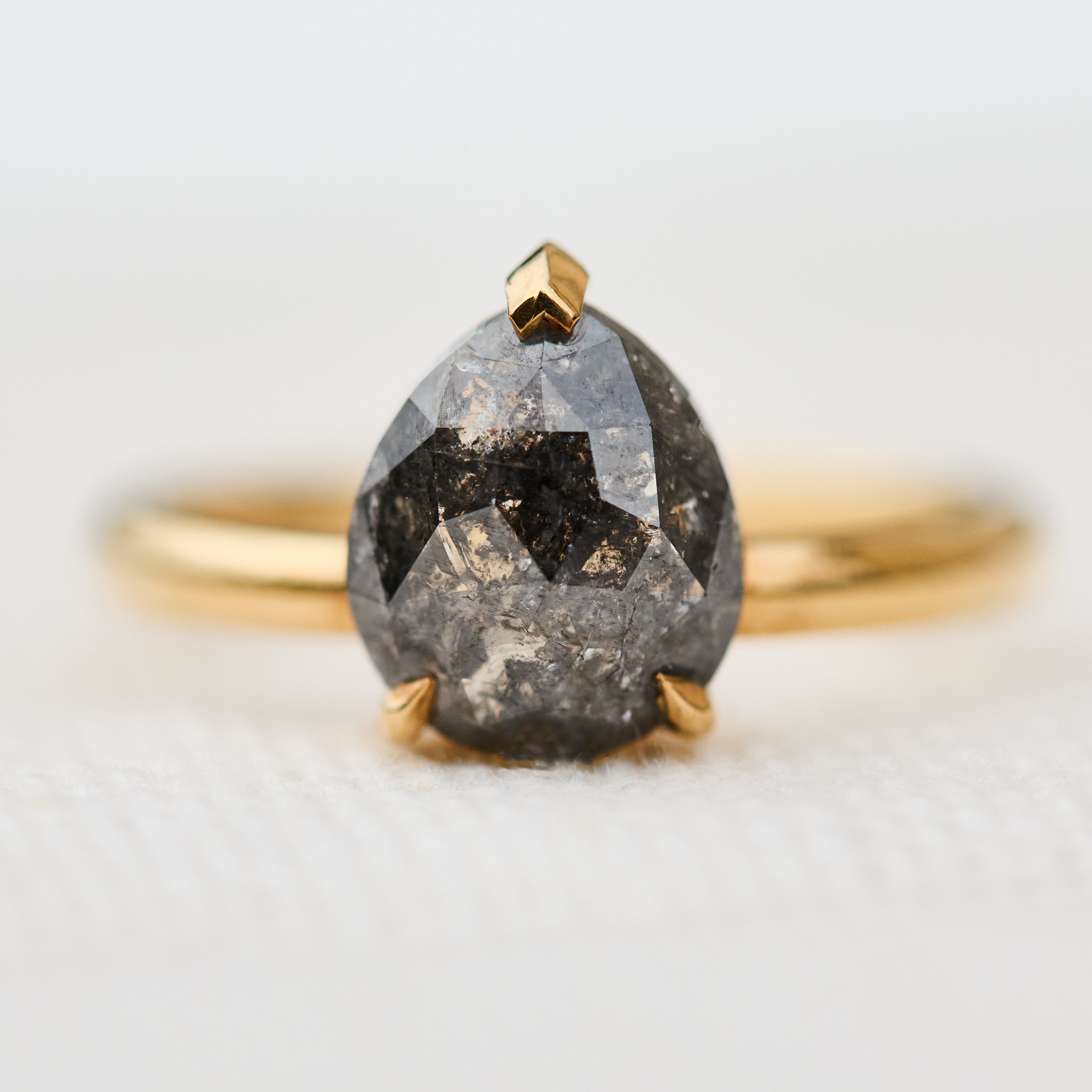 pear shape salt and pepper diamond solitaire ring