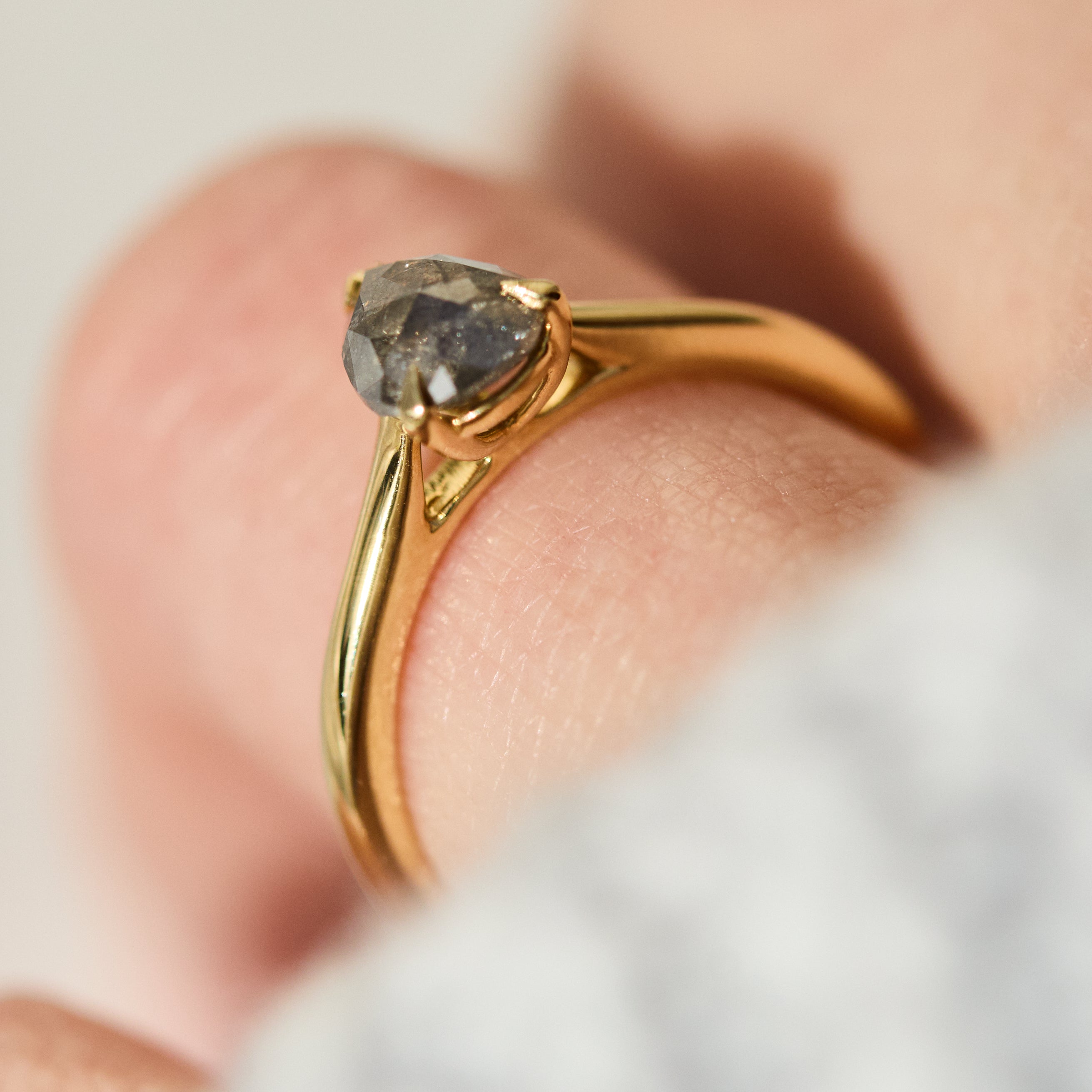 pear shape salt and pepper solitaire ring