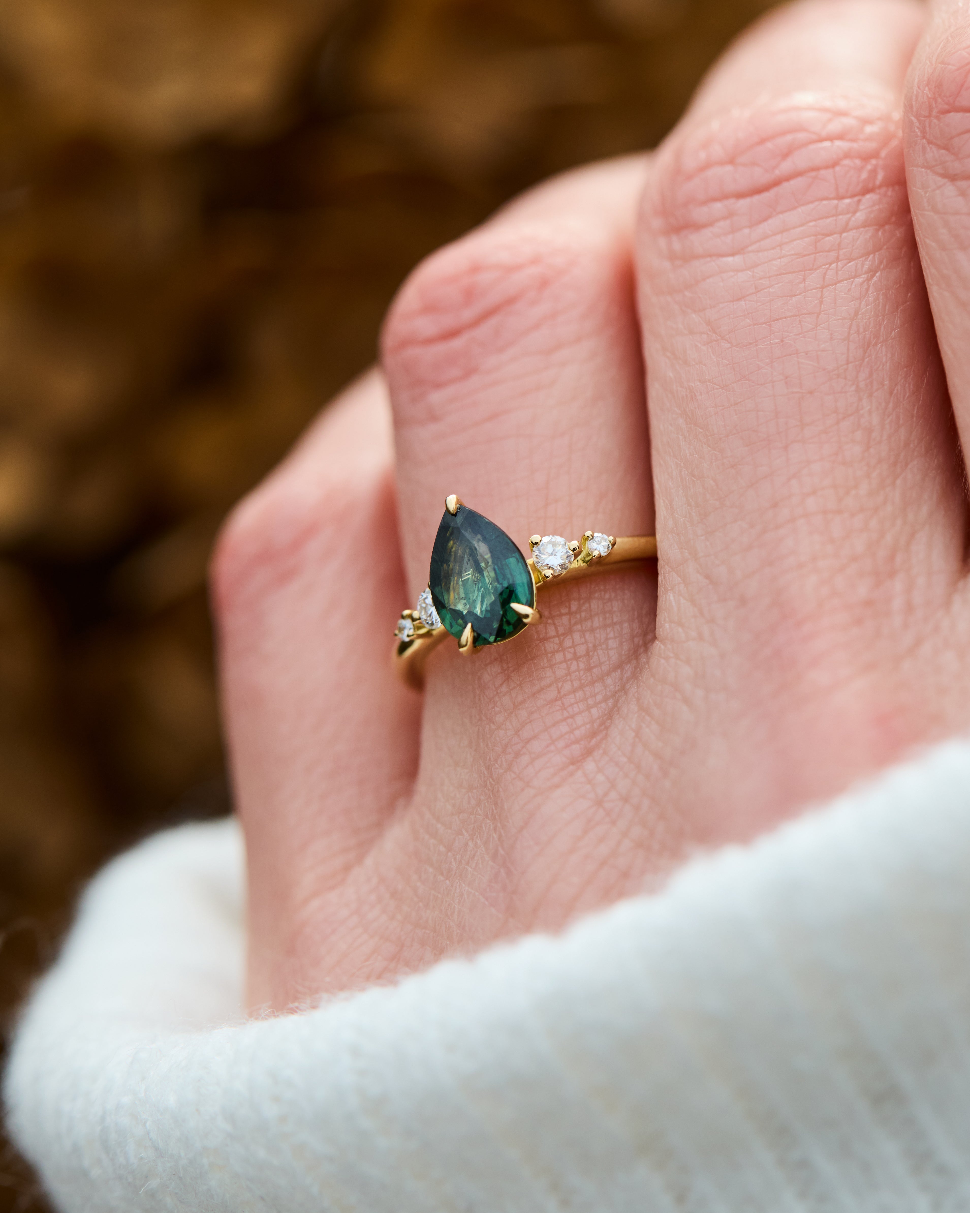 pear shape sapphire five stone yellow gold engagement ring