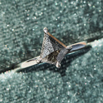 kite shape salt and pepper solitaire engagement ring in platinum