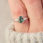 platinum oval teal sapphire engagement ring