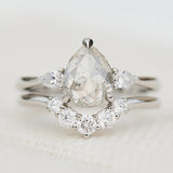 platinum pear shape rose cut salt and pepper diamond trilogy engagement ring