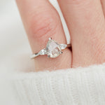 platinum pear shape rose cut salt and pepper diamond trilogy engagement ring