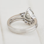 platinum pear shape rose cut salt and pepper diamond trilogy engagement ring