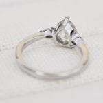 platinum pear shape rose cut salt and pepper diamond trilogy engagement ring