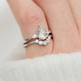 platinum pear shape rose cut salt and pepper diamond trilogy engagement ring