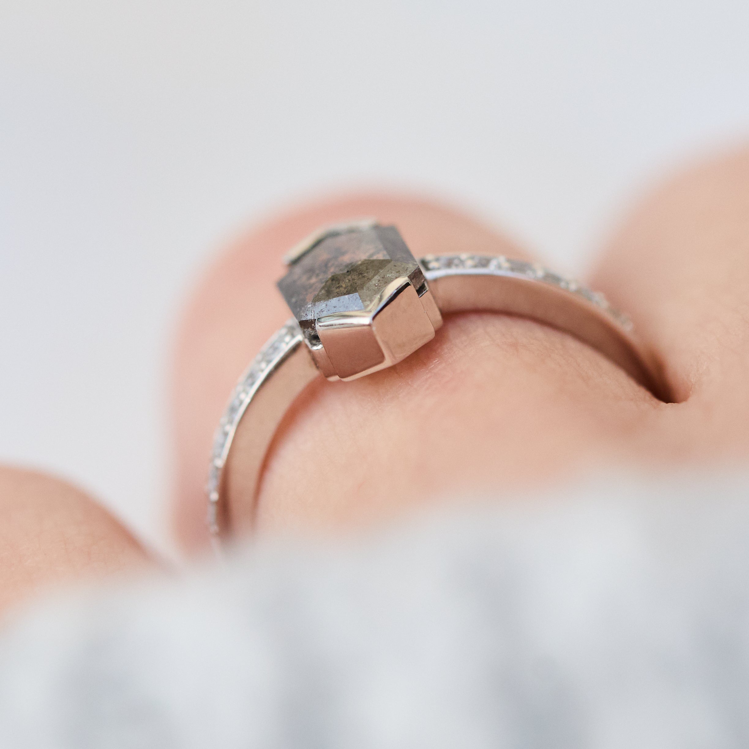 Platinum salt and pepper hexagon diamond engagement pavé ring