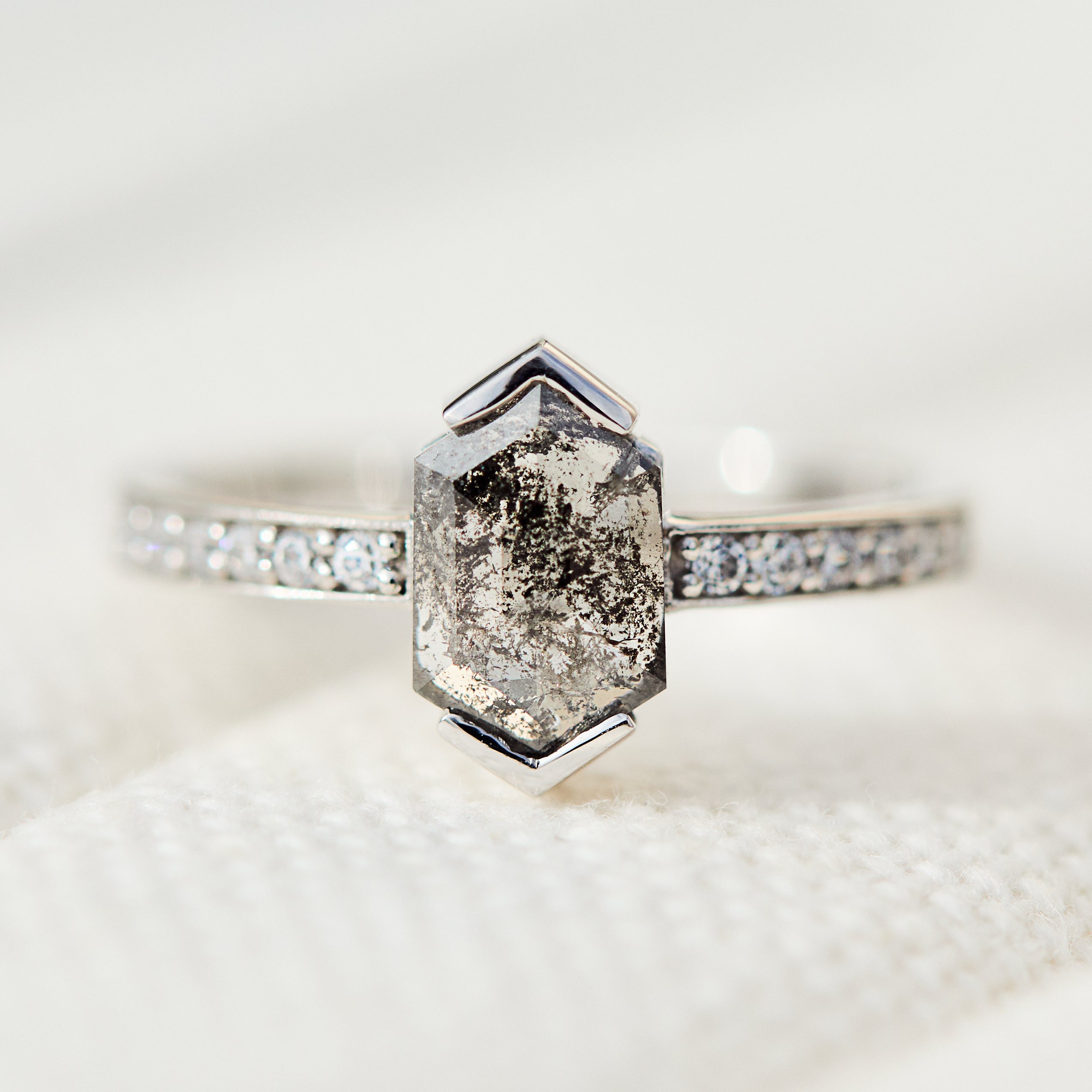 Platinum salt and pepper hexagon diamond engagement pavé ring