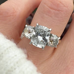 elongated cushion lab grown diamond trilogy engagement ring in yellow gold