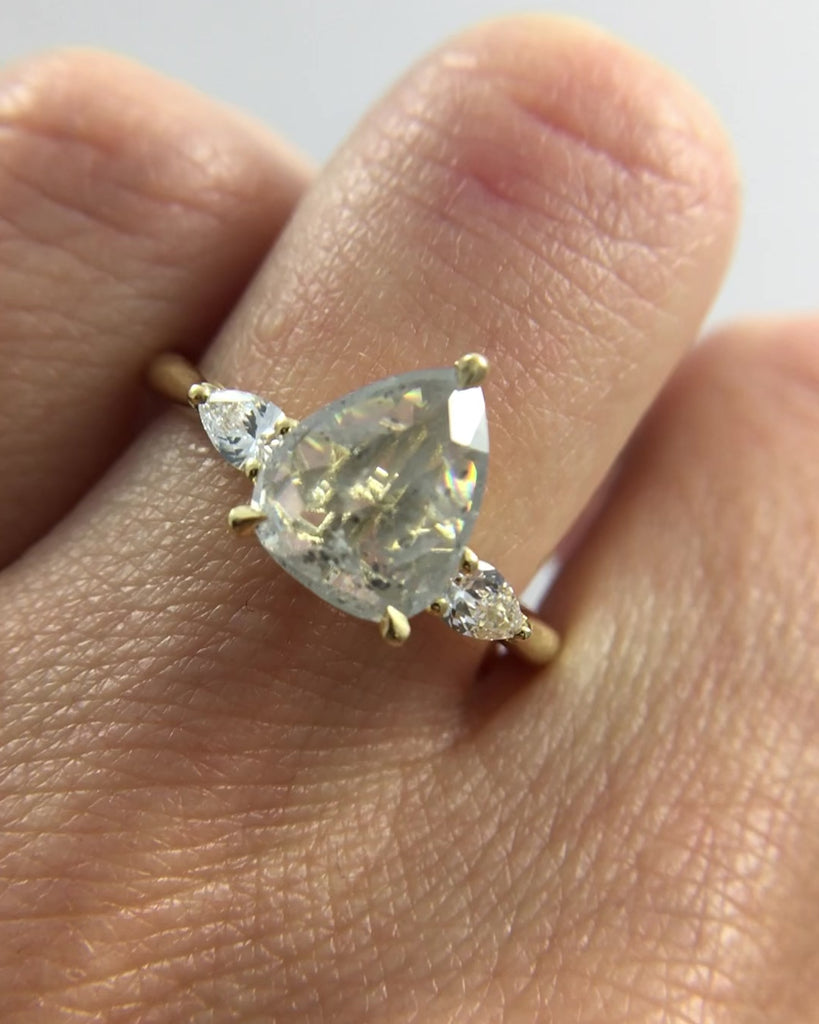 18ct yellow gold salt and pepper pear diamond engagement trilogy ring