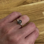 18ct yellow gold salt and pepper oval diamond engagement trilogy ring