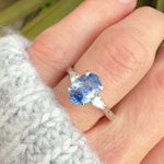 oval sri lankan blue sapphire trilogy platinum engagement ring