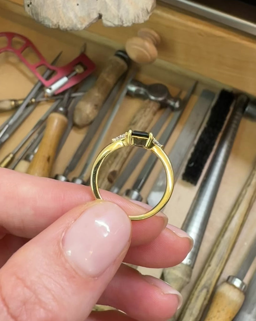 18ct yellow gold emerald cut trilogy ​teal sapphire rings