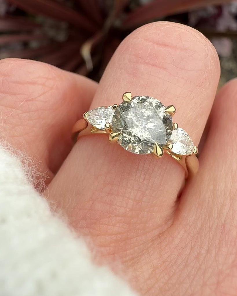 round brilliant cut salt and pepper diamond engagement ring in yellow gold