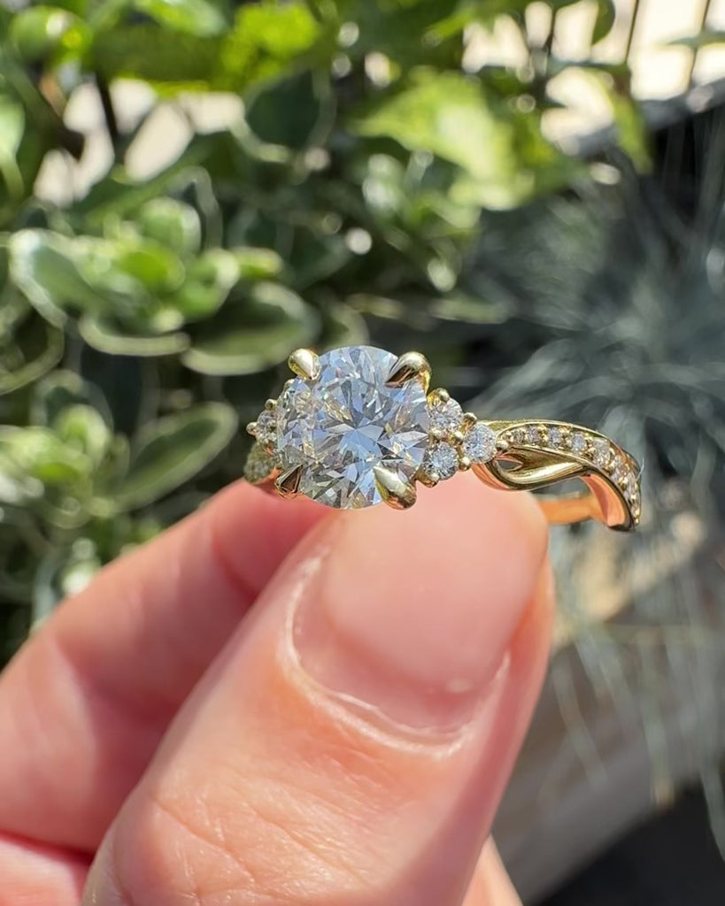 round diamond one of a kind engagement ring set in 18ct yellow gold
