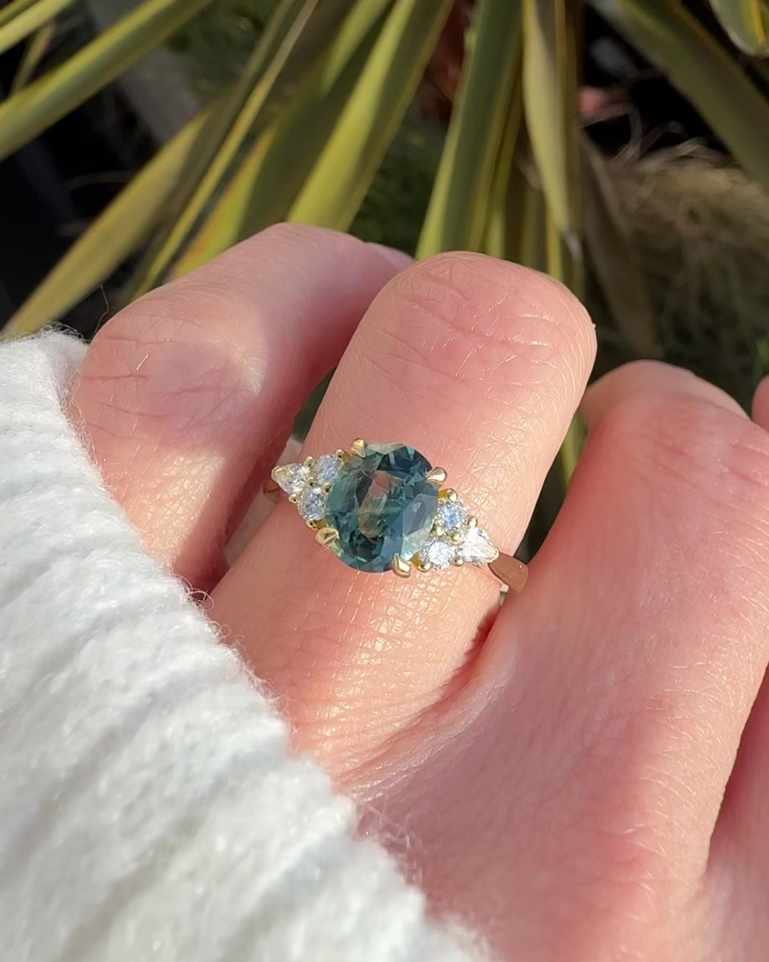 oval unheated green teal sapphire engagement ring in yellow gold