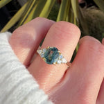 oval unheated green teal sapphire engagement ring in yellow gold