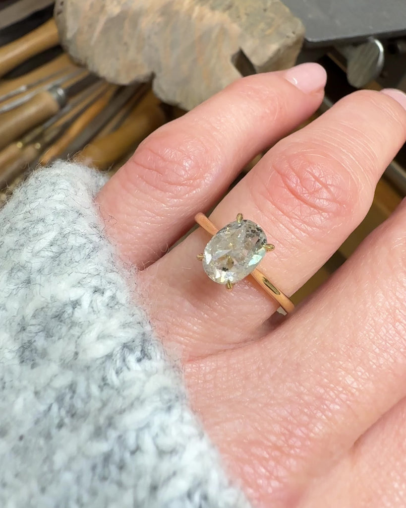 oval icy salt and pepper diamond solitaire ring