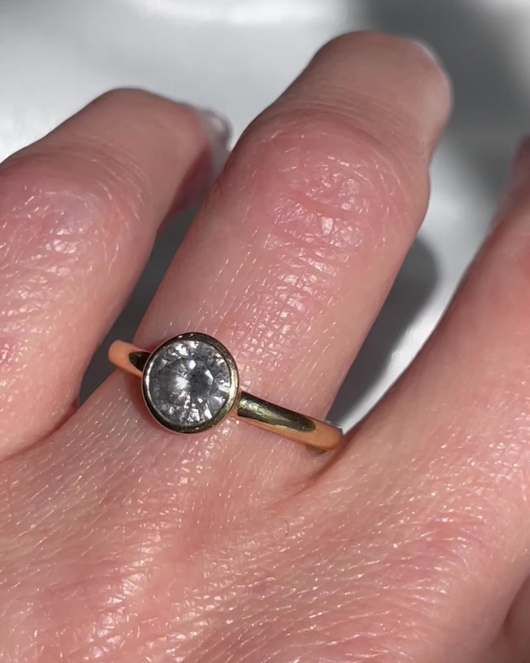 18ct yellow gold salt and pepper round brilliant cut diamond engagement bezel ring