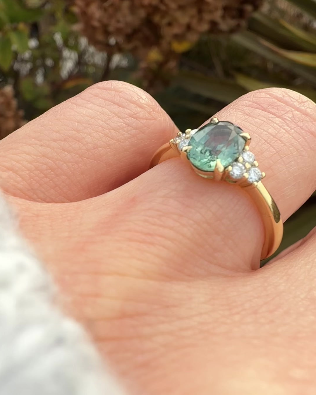 oval green teal sapphire ring