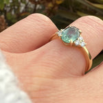 oval green teal sapphire ring