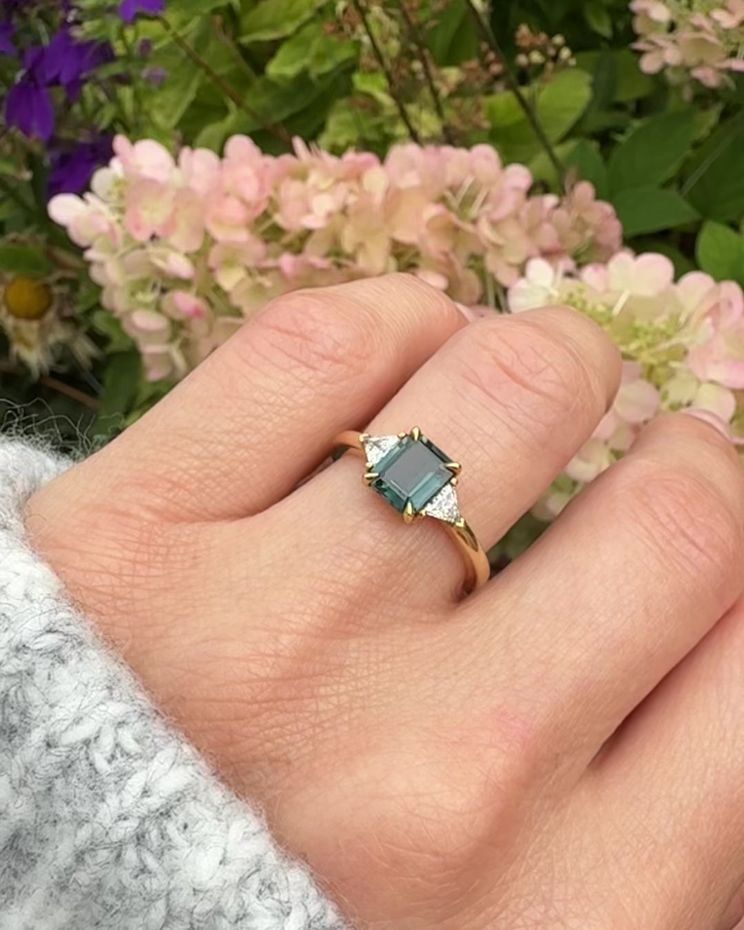 18ct yellow gold emerald cut trilogy ​teal sapphire rings