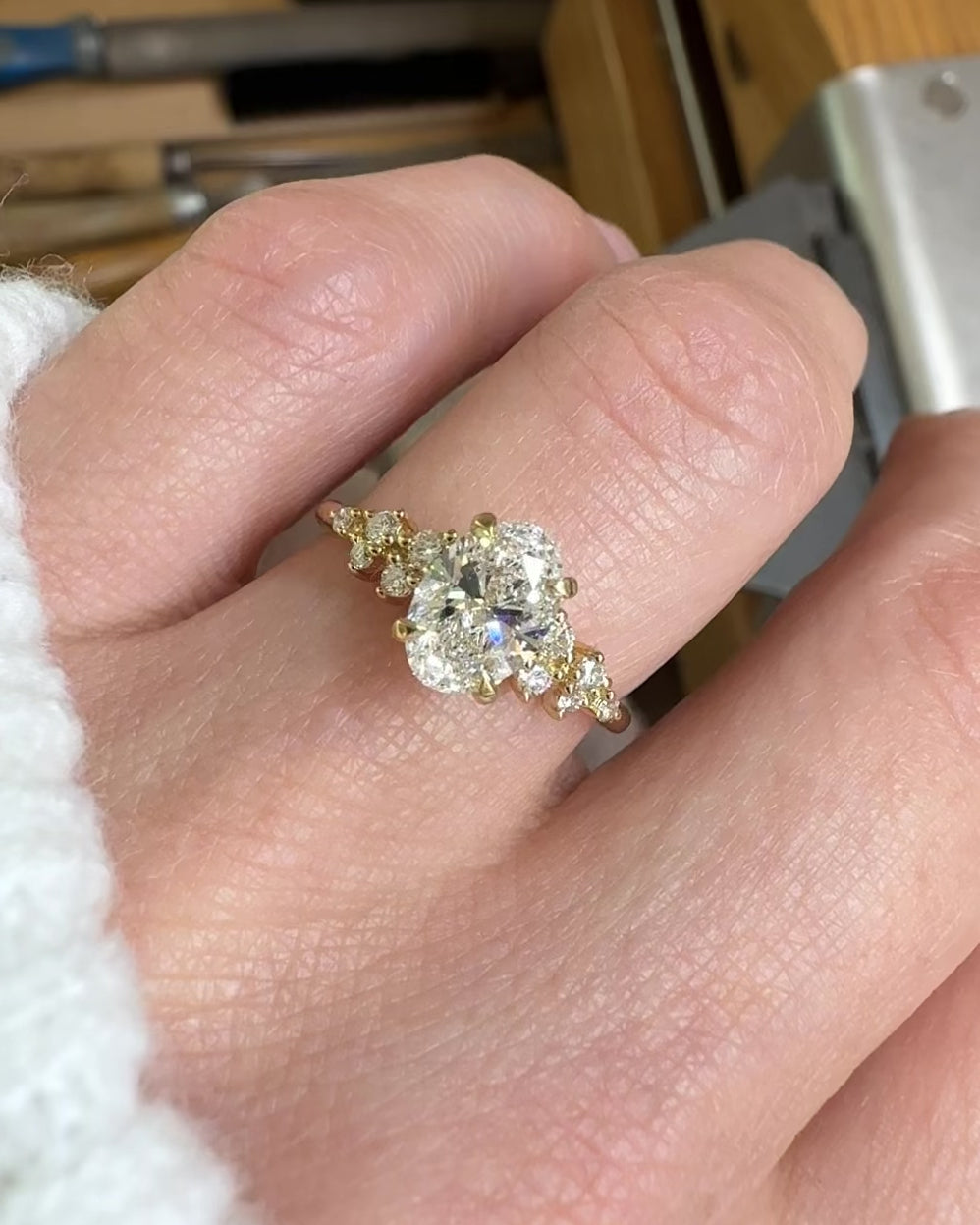 oval lab grown diamond engagement ring set in timeless yellow gold