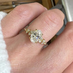 oval lab grown diamond engagement ring set in timeless yellow gold