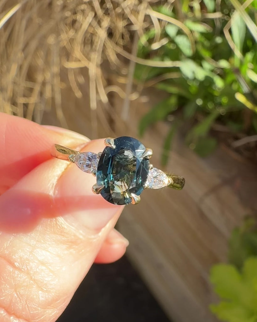 australian oval teal sapphire diamond yellow gold engagement ring
