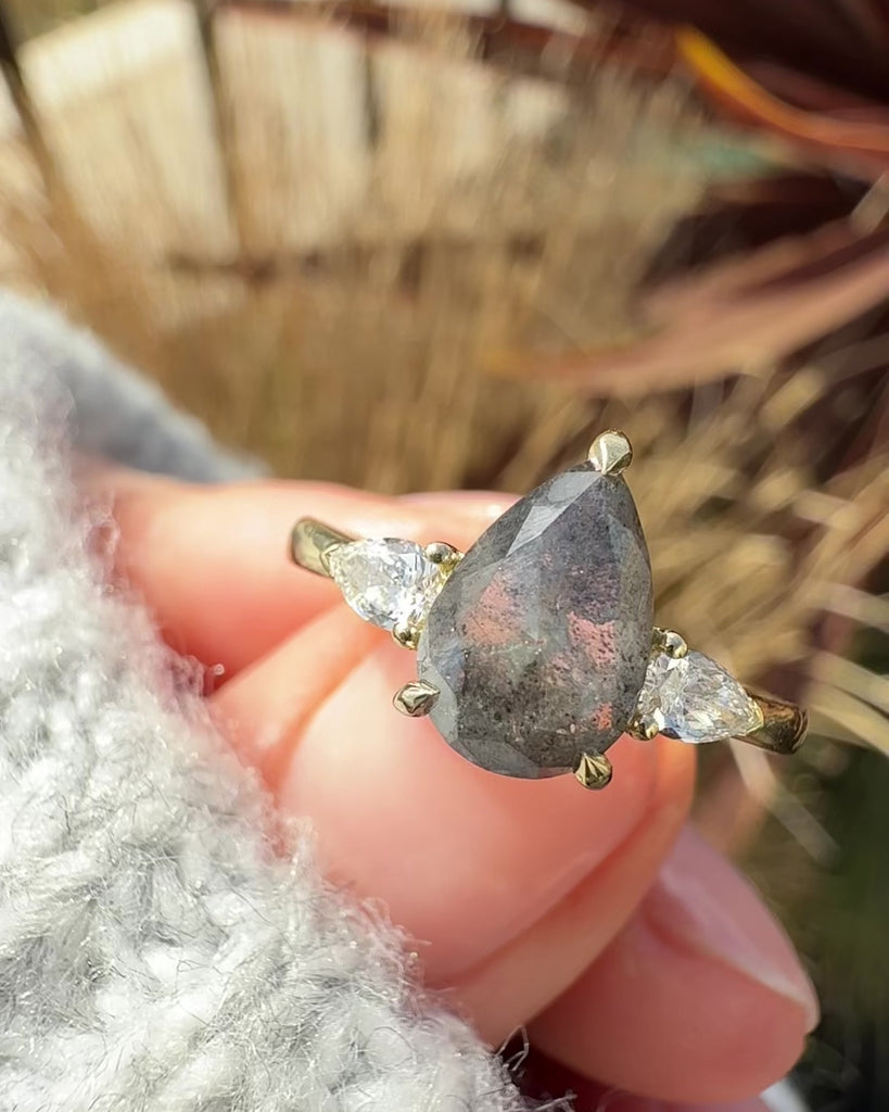 dark and stormy pear shape salt and pepper trilogy diamond ring