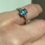 Oval Blue Teal Sapphire Engagement Ring Trilogy