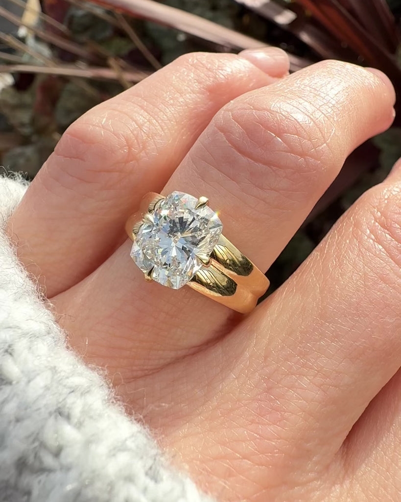 cushion cut lab grown diamond solitaire engagement ring in yellow gold